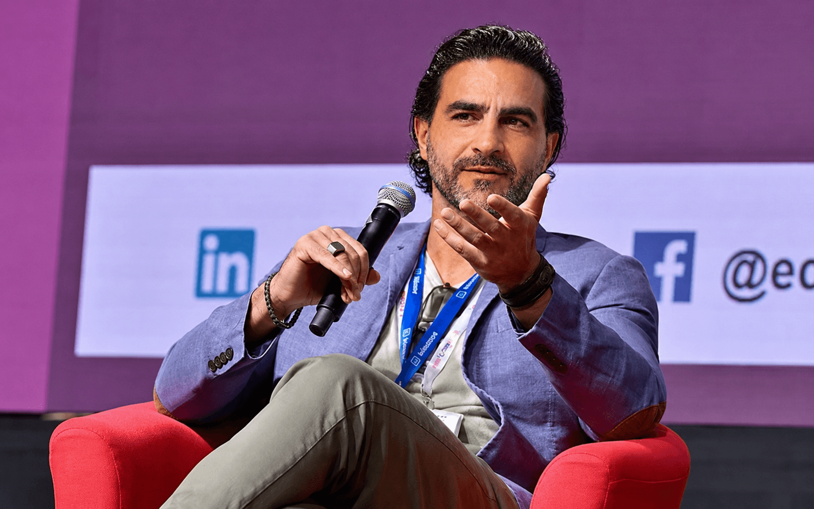 Hossein Tohidi (Unclecode), Kidocode founder and creator of Crawl4AI, speaking at a tech conference